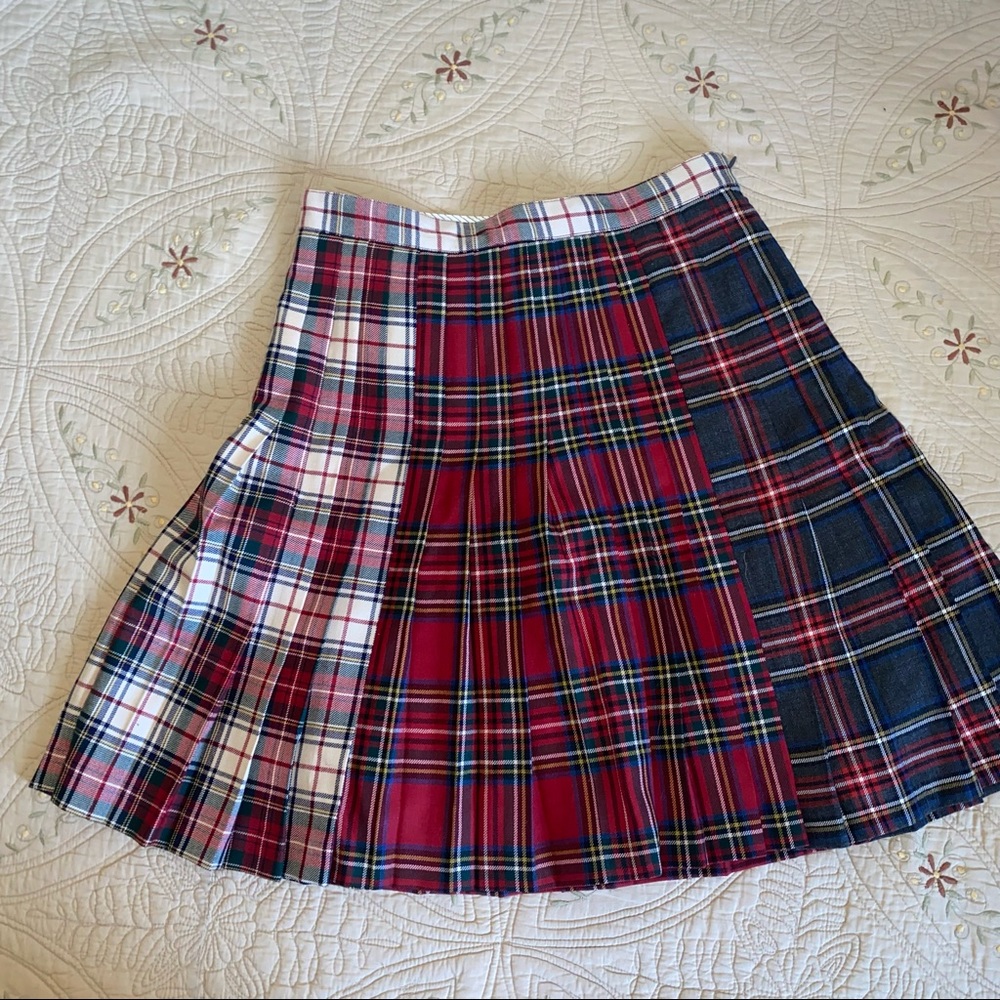 Has red white and black color ways in plaid.